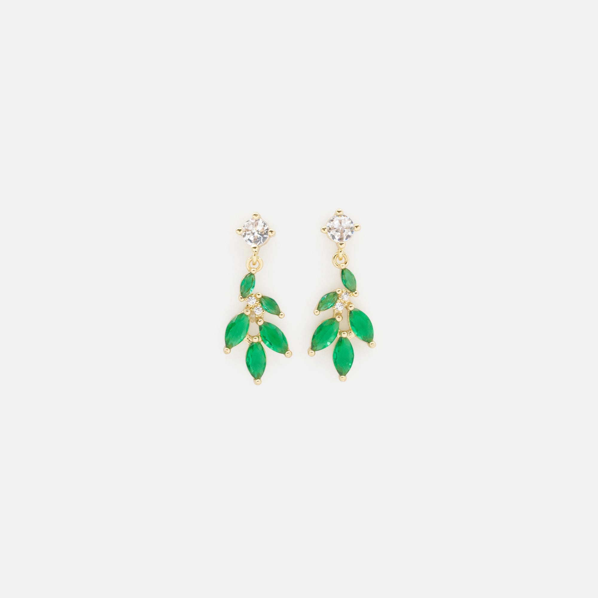 Gold earrings with emerald leaves