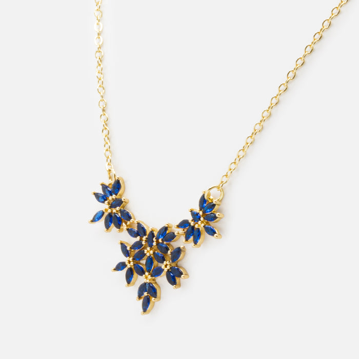 Collier doré petites fleurs marine