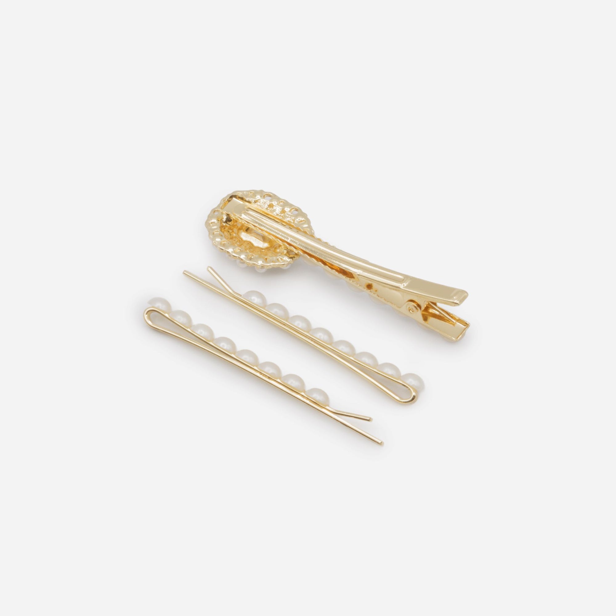 Set of three pearl gold clips with cubic zirconia