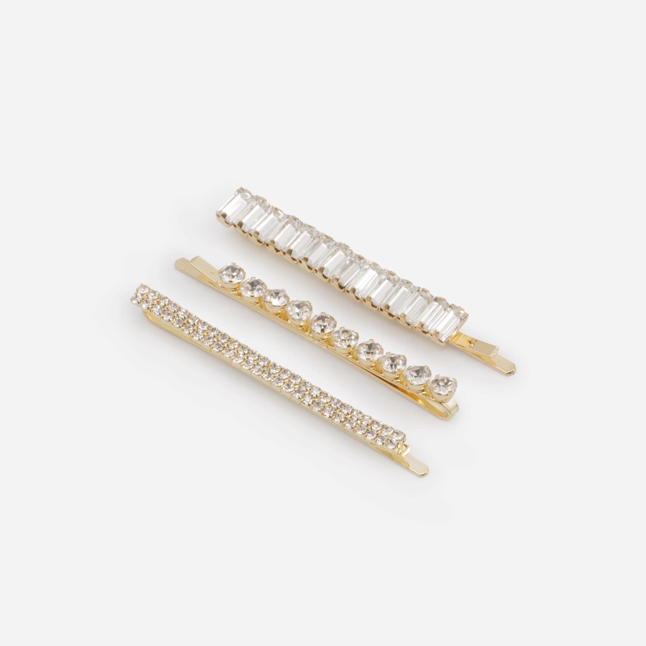 Set of three gold clips with cubic zirconia