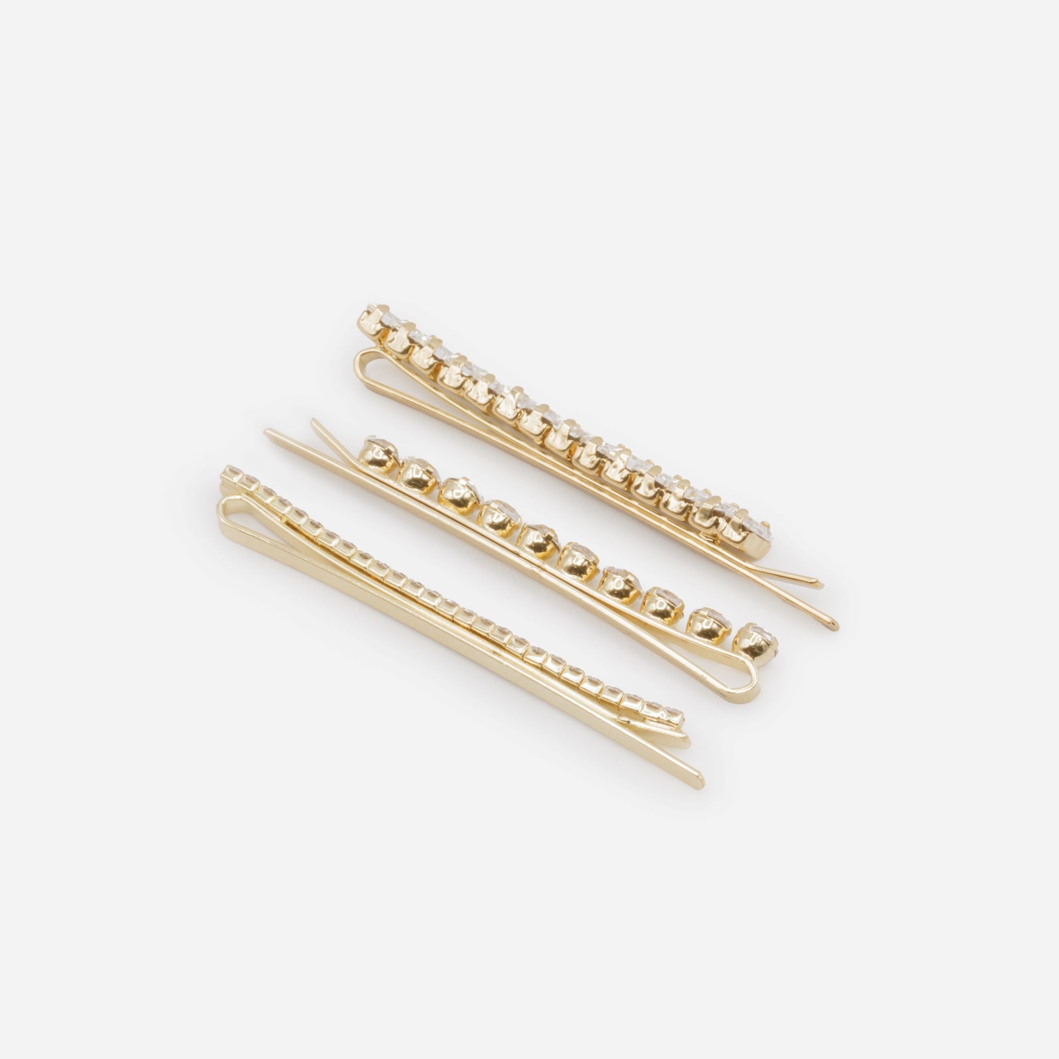 Set of three gold clips with cubic zirconia