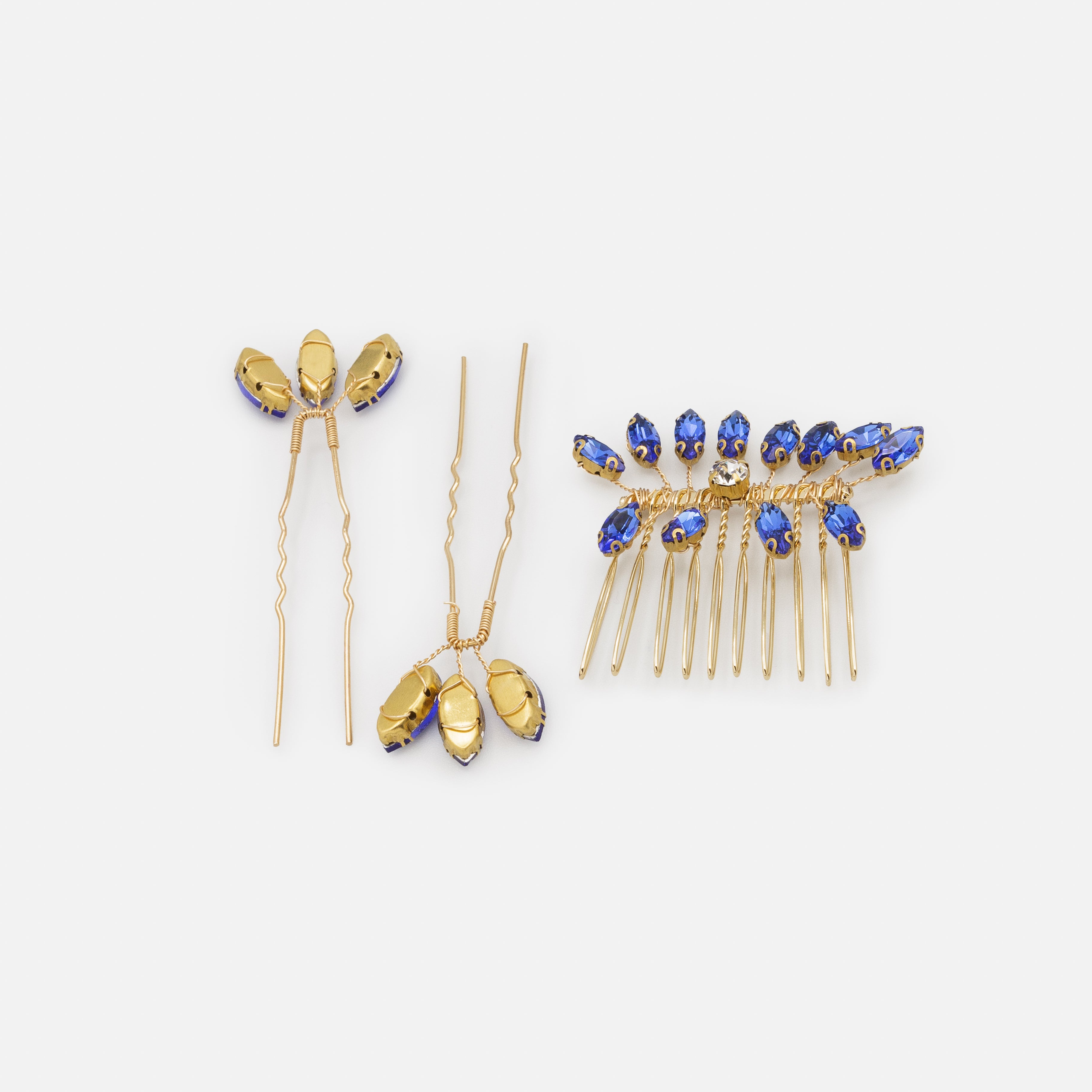 Gold comb and pin set with royal blue stones