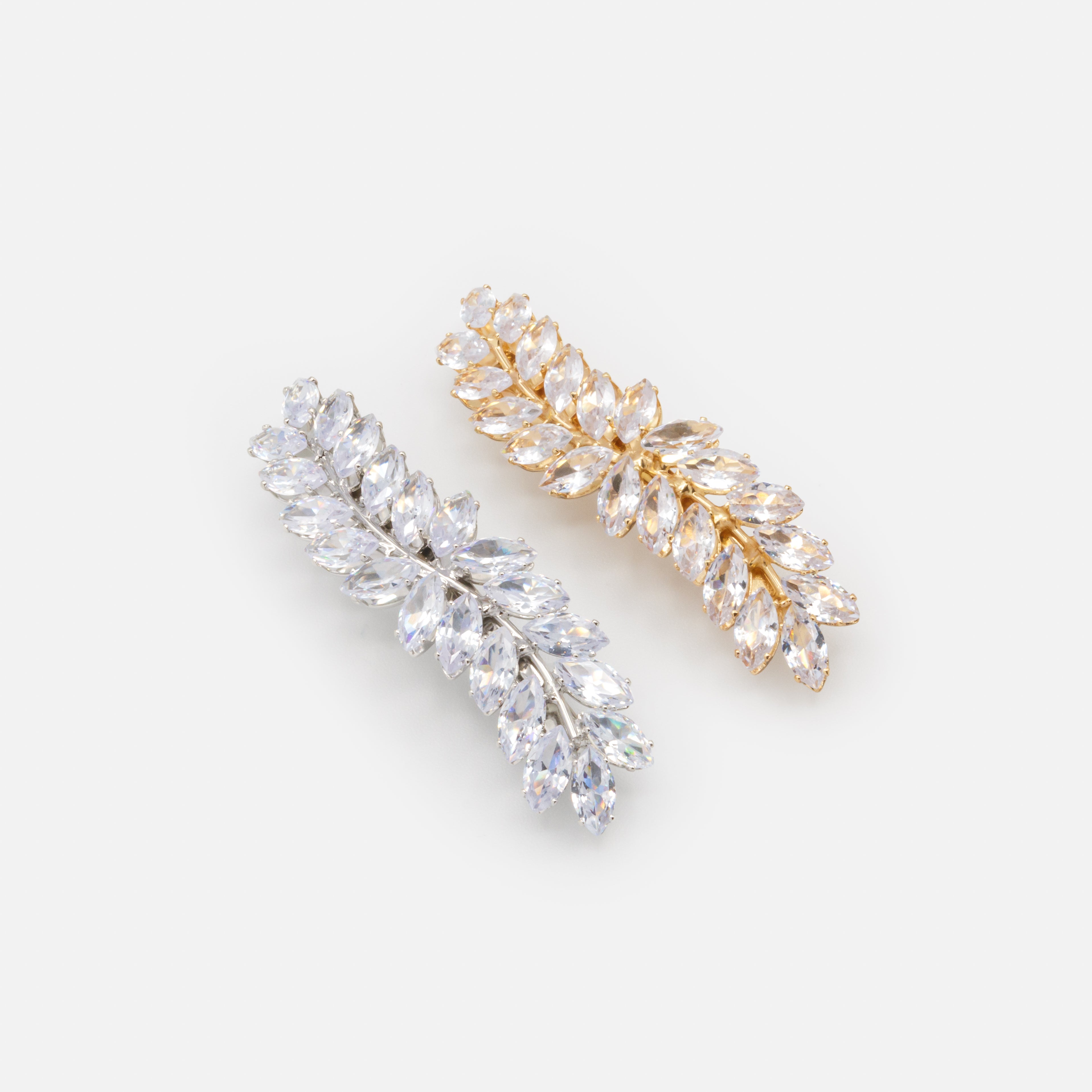 Duo of gold and silver leaf clips