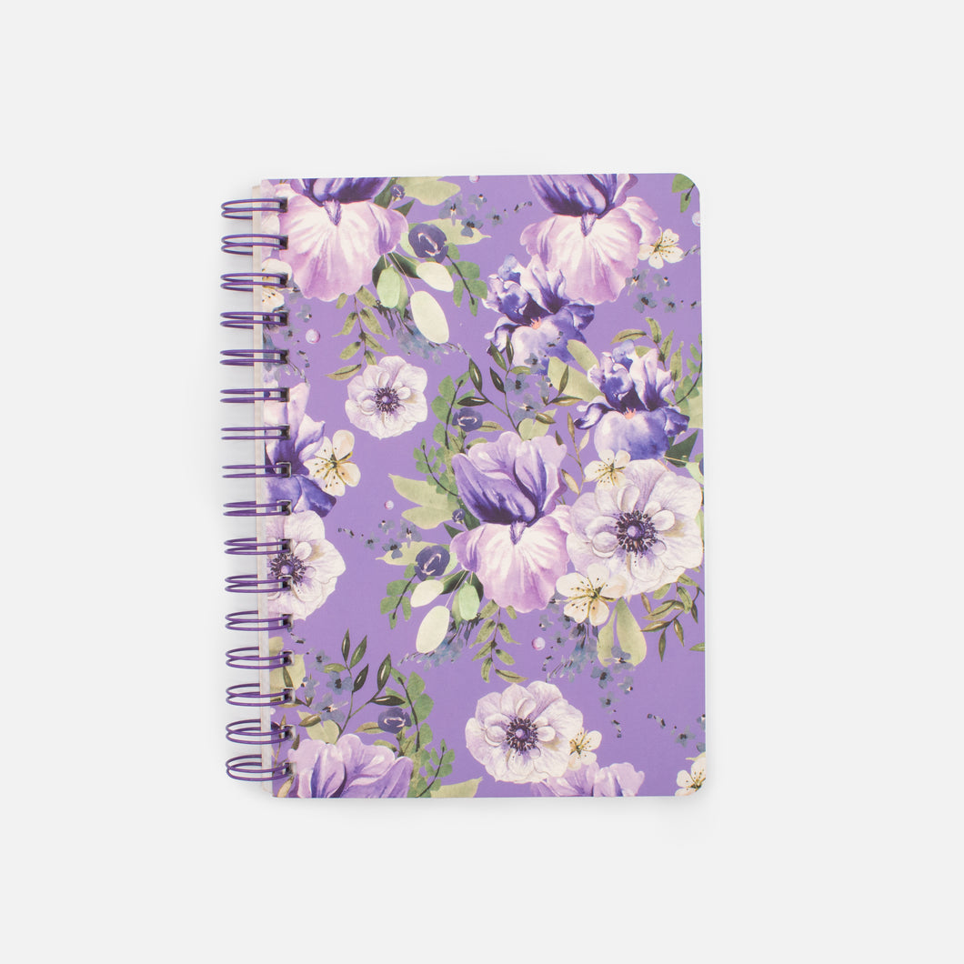 Cahier de notes lilas avec fleurs