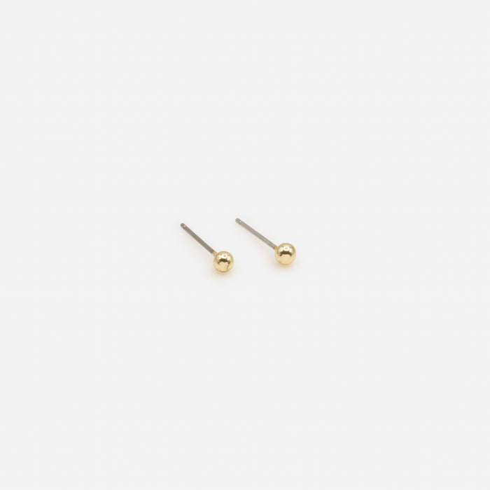 Trio de boucles d'oreilles dorées et argentées