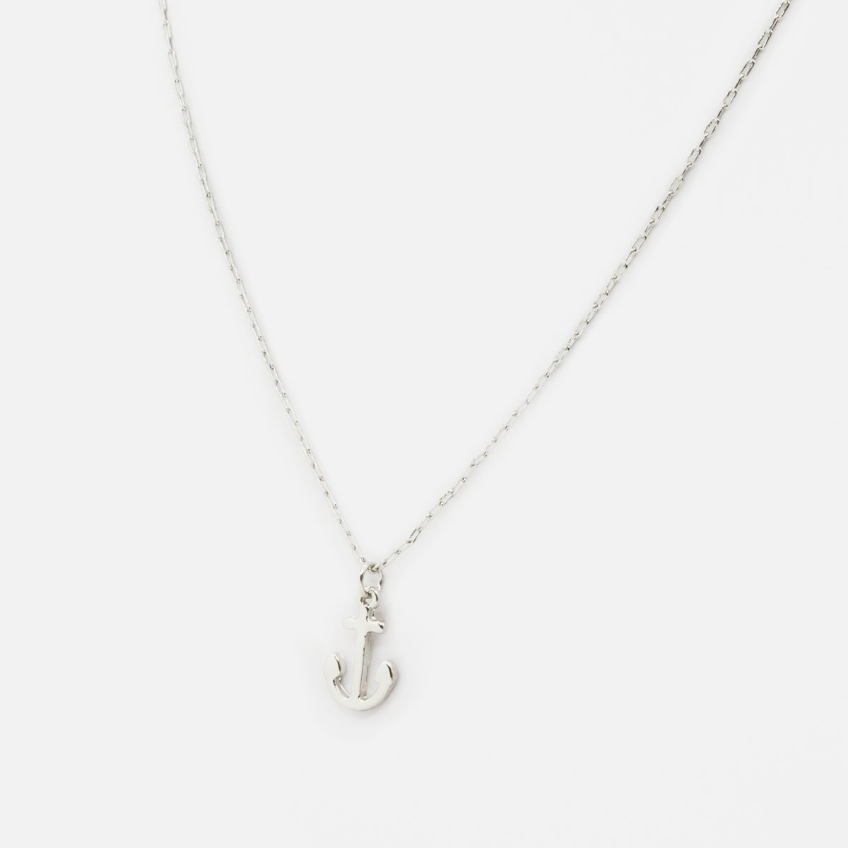 Silvered chain with anchor charm