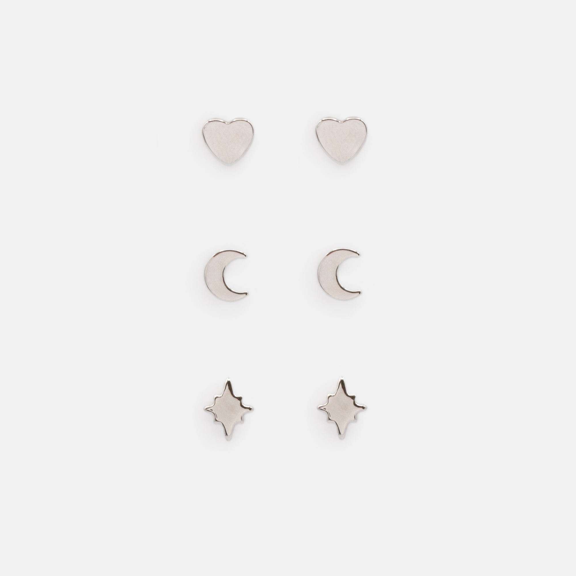 Set of 3 pairs of silvered fixed earrings