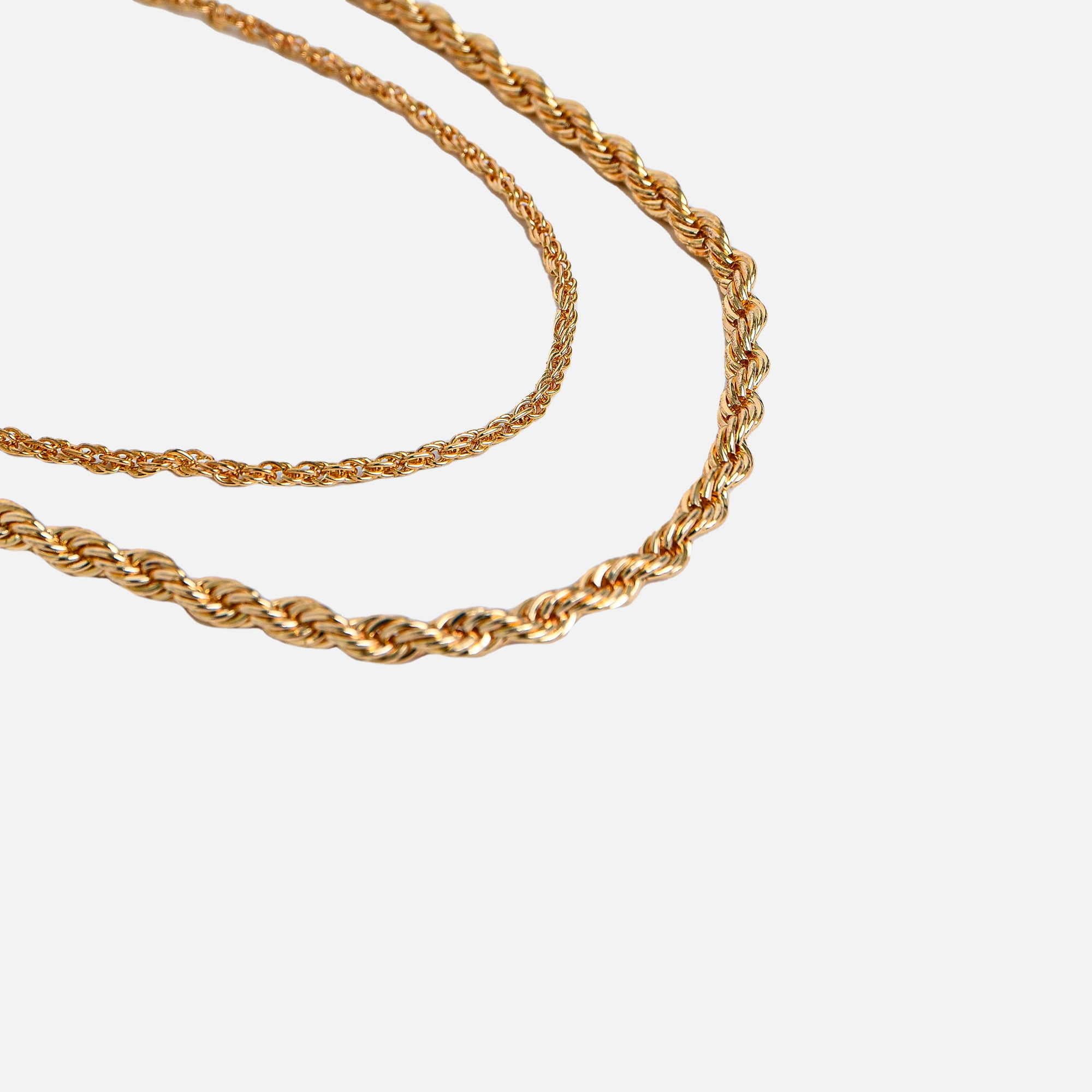 Duo of twisted golden chains