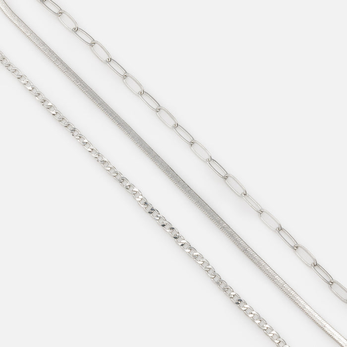 Set of three silver bracelets with delicate links