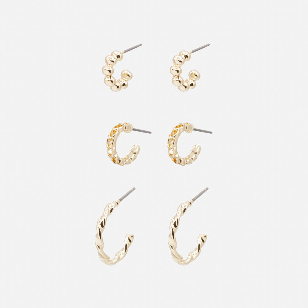 Trio of textured gold hoop earrings