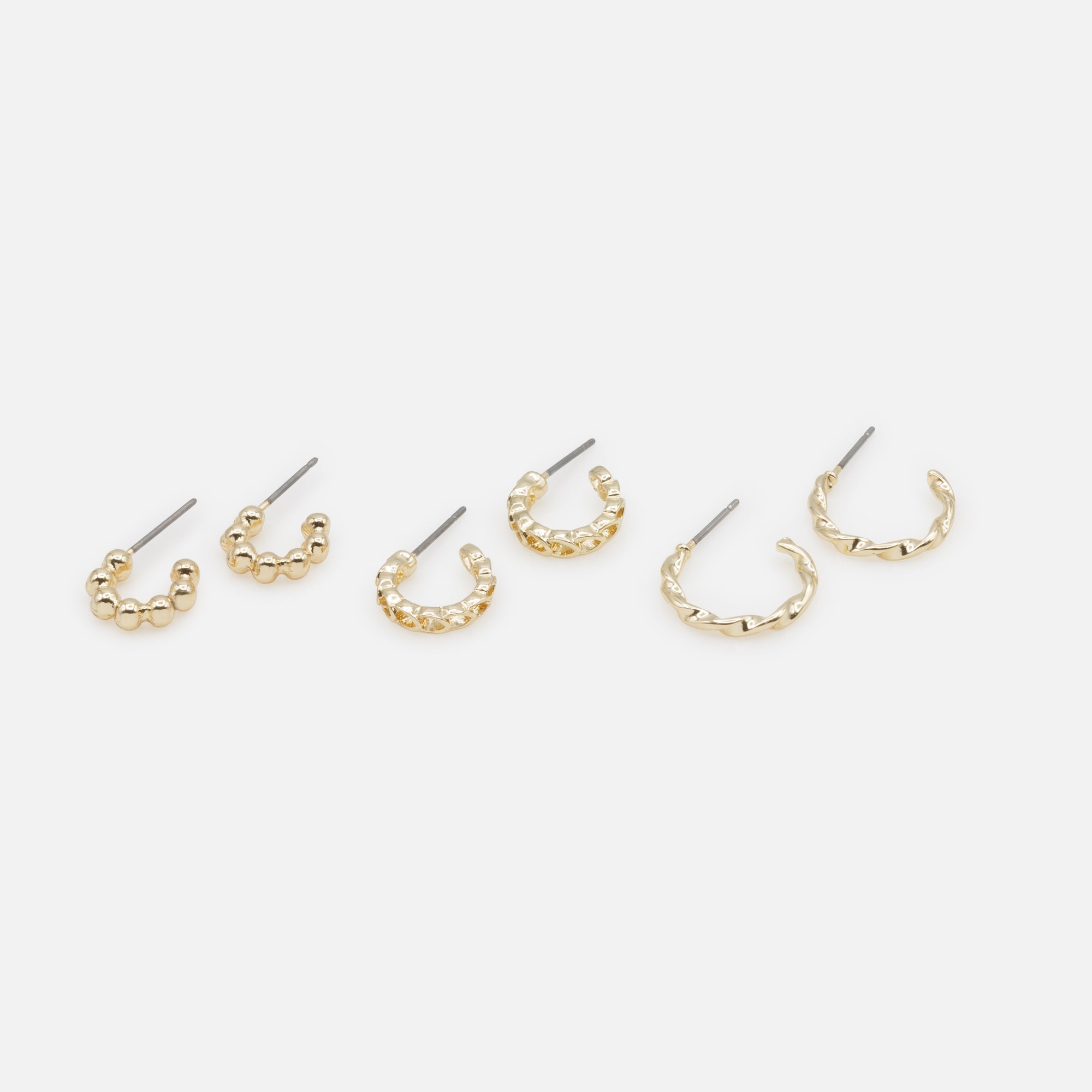 Trio de boucles d'oreilles anneaux dorés texturés