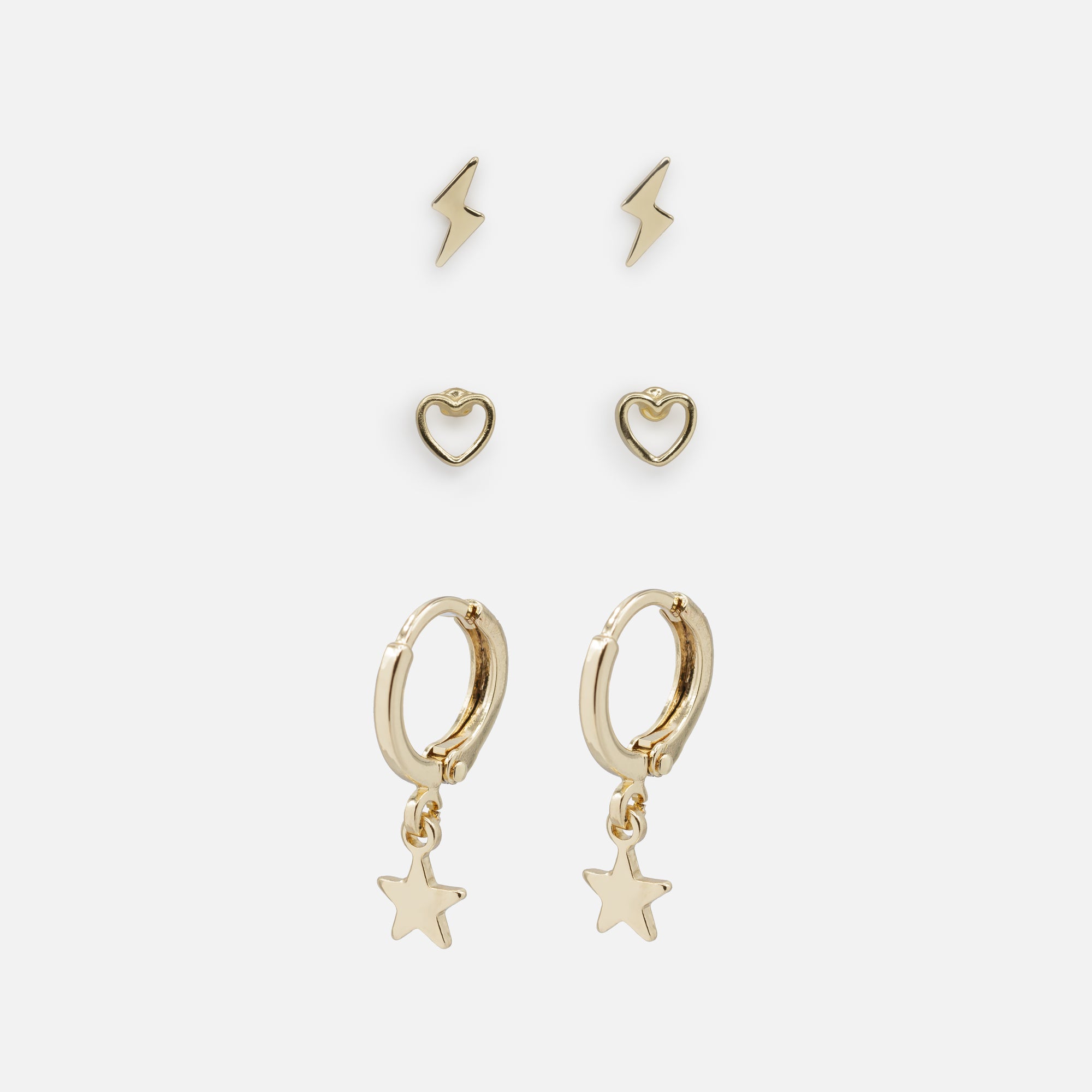 Trio of gold lightning bolt heart and star earrings