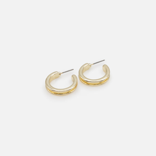 Load image into Gallery viewer, Duo of crisscrossed and recessed golden hoop earrings
