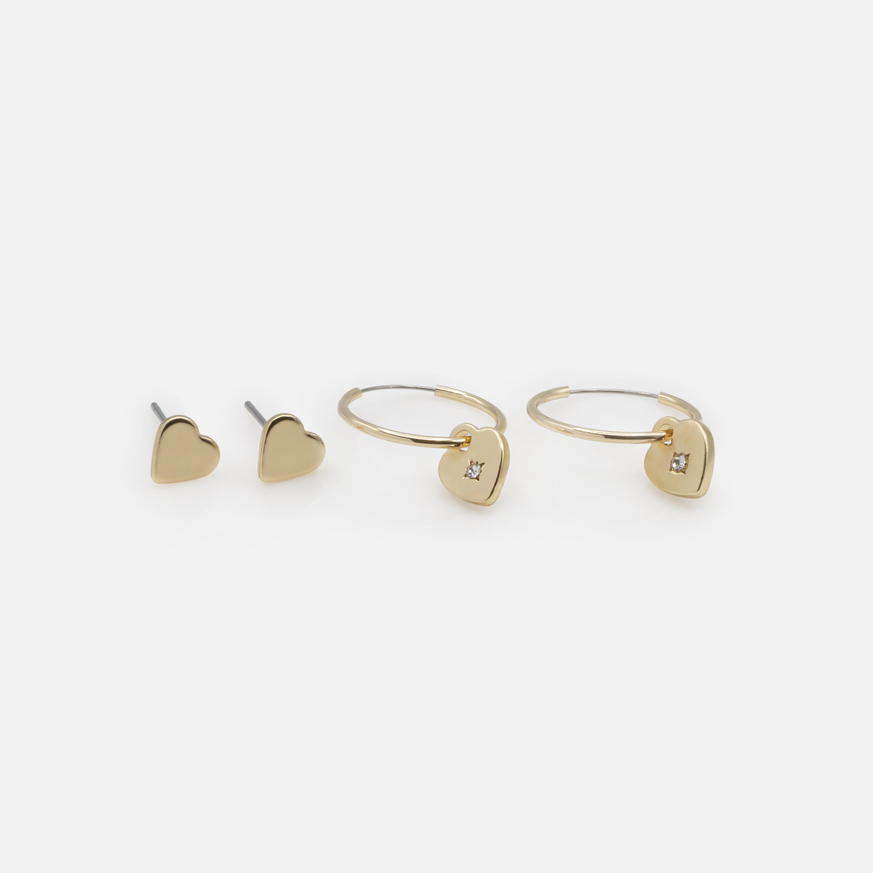 Fixed earrings and gold heart rings