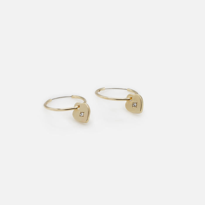 Fixed earrings and gold heart rings