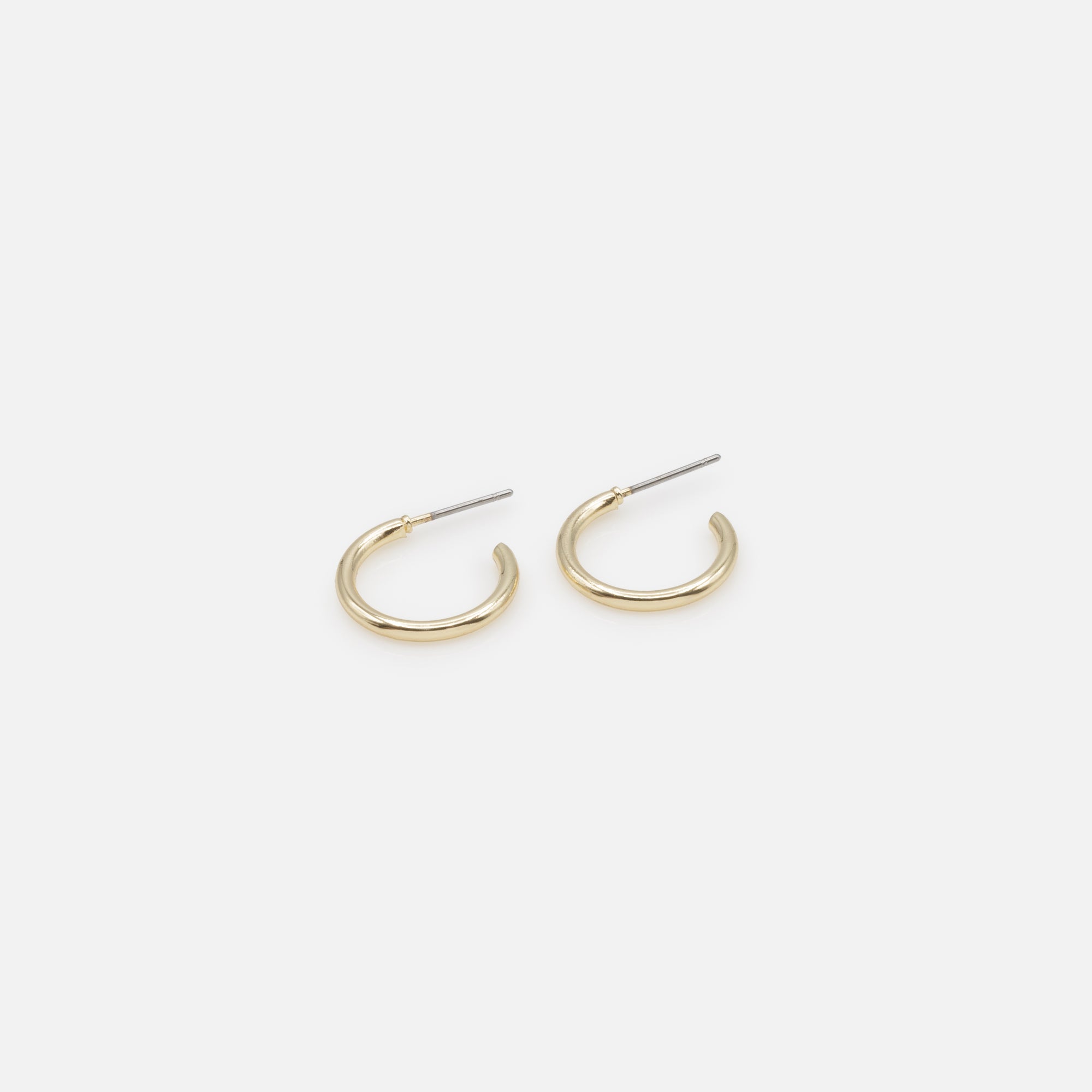 Duo of simple gold hoop earrings with white band