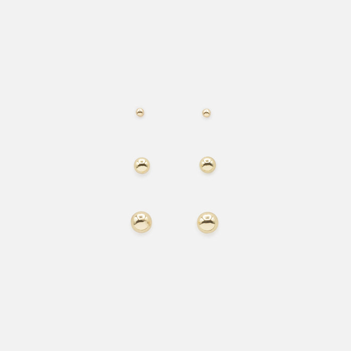 Trio of golden ball earrings in three sizes
