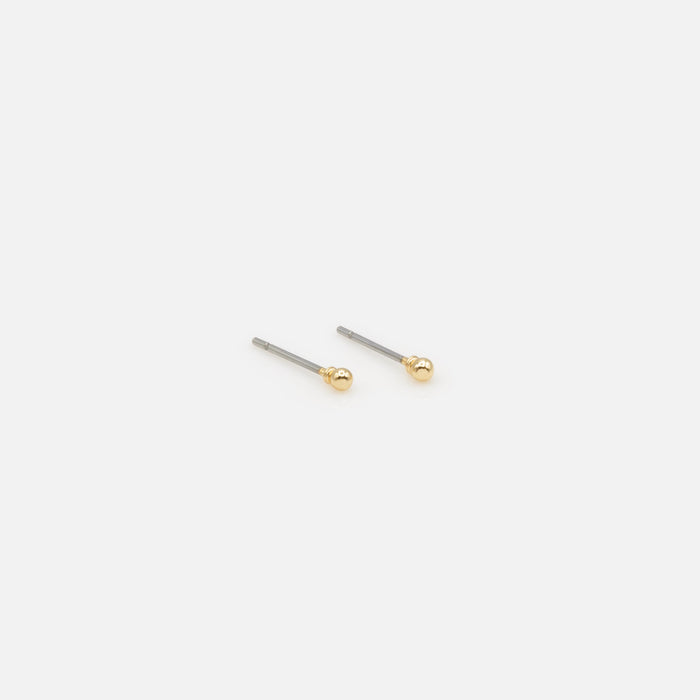 Trio of golden ball earrings in three sizes