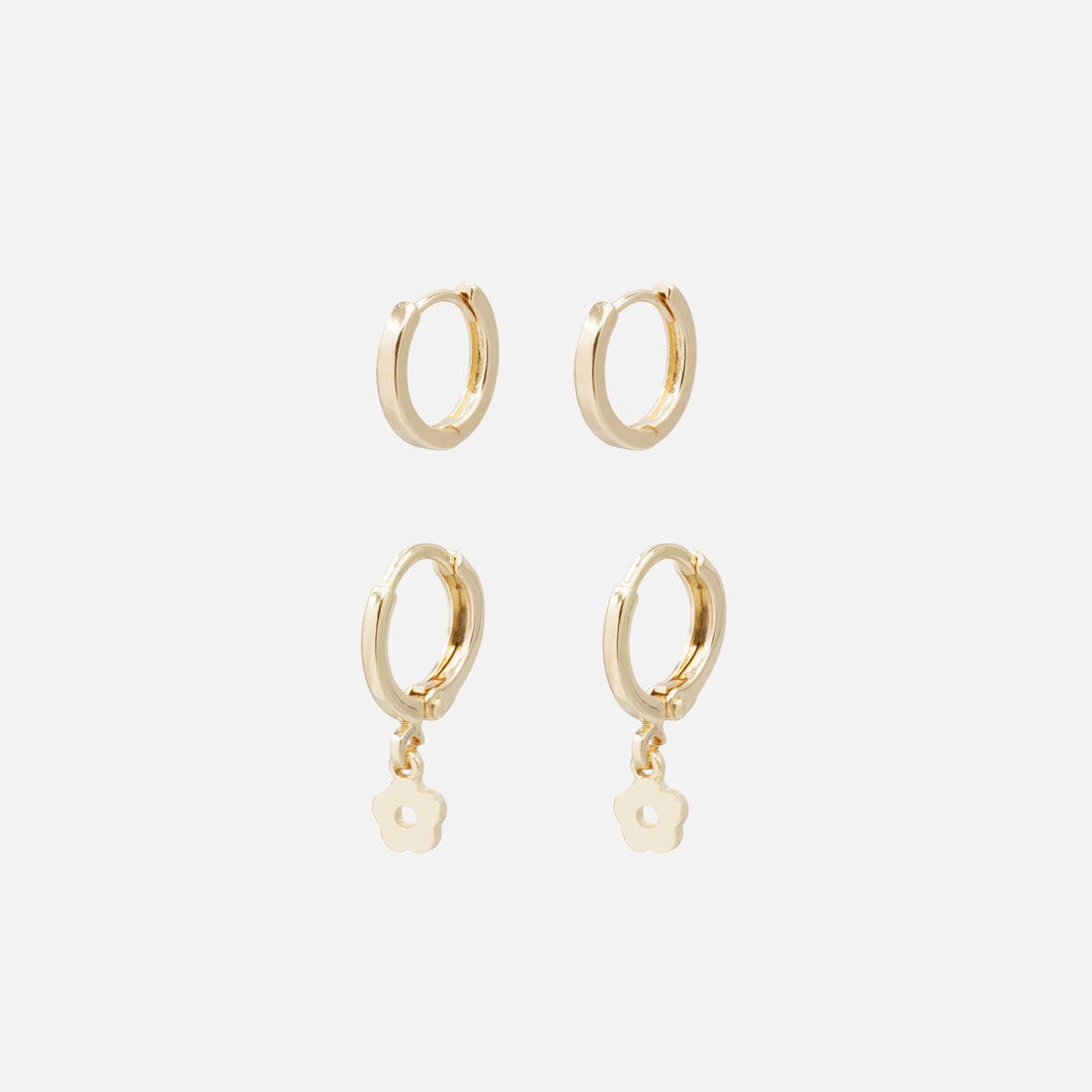 Duo of simple gold hoop earrings and flower charm