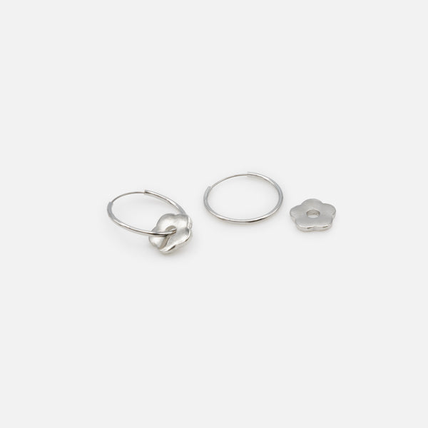 Load image into Gallery viewer, Silver hoop earrings with textured flower charm
