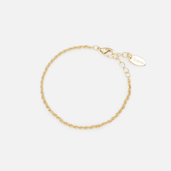 Load image into Gallery viewer, Set of four golden bracelets with fine and varied links
