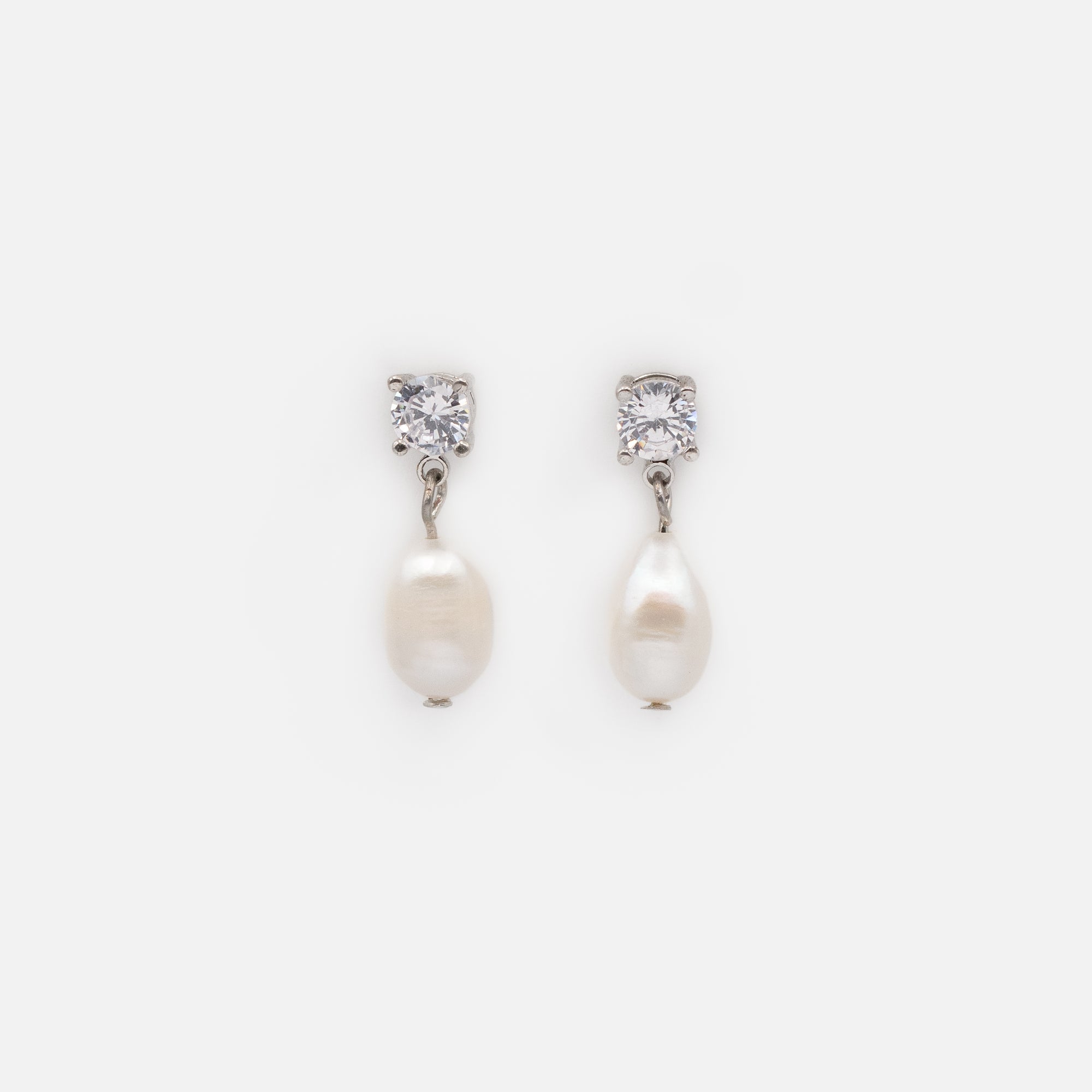 Earrings with stone and pearl