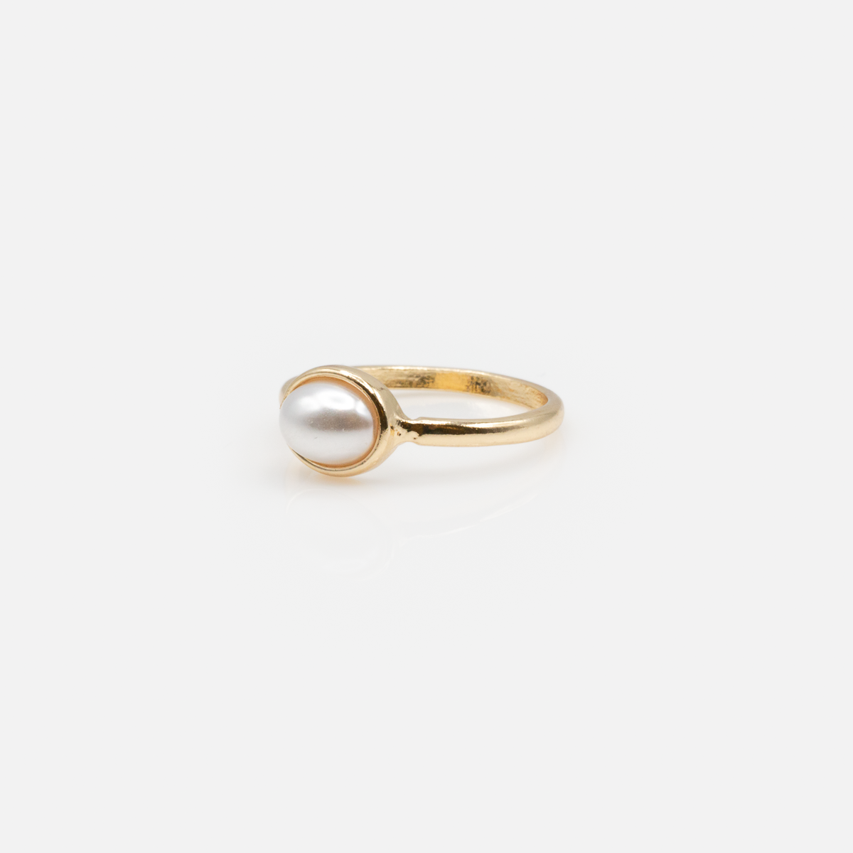 Set of three golden rings with pearls