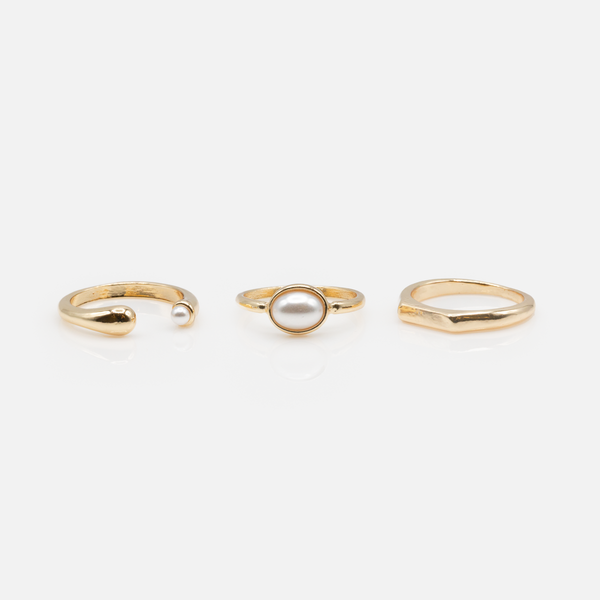 Load image into Gallery viewer, Set of three golden rings with pearls
