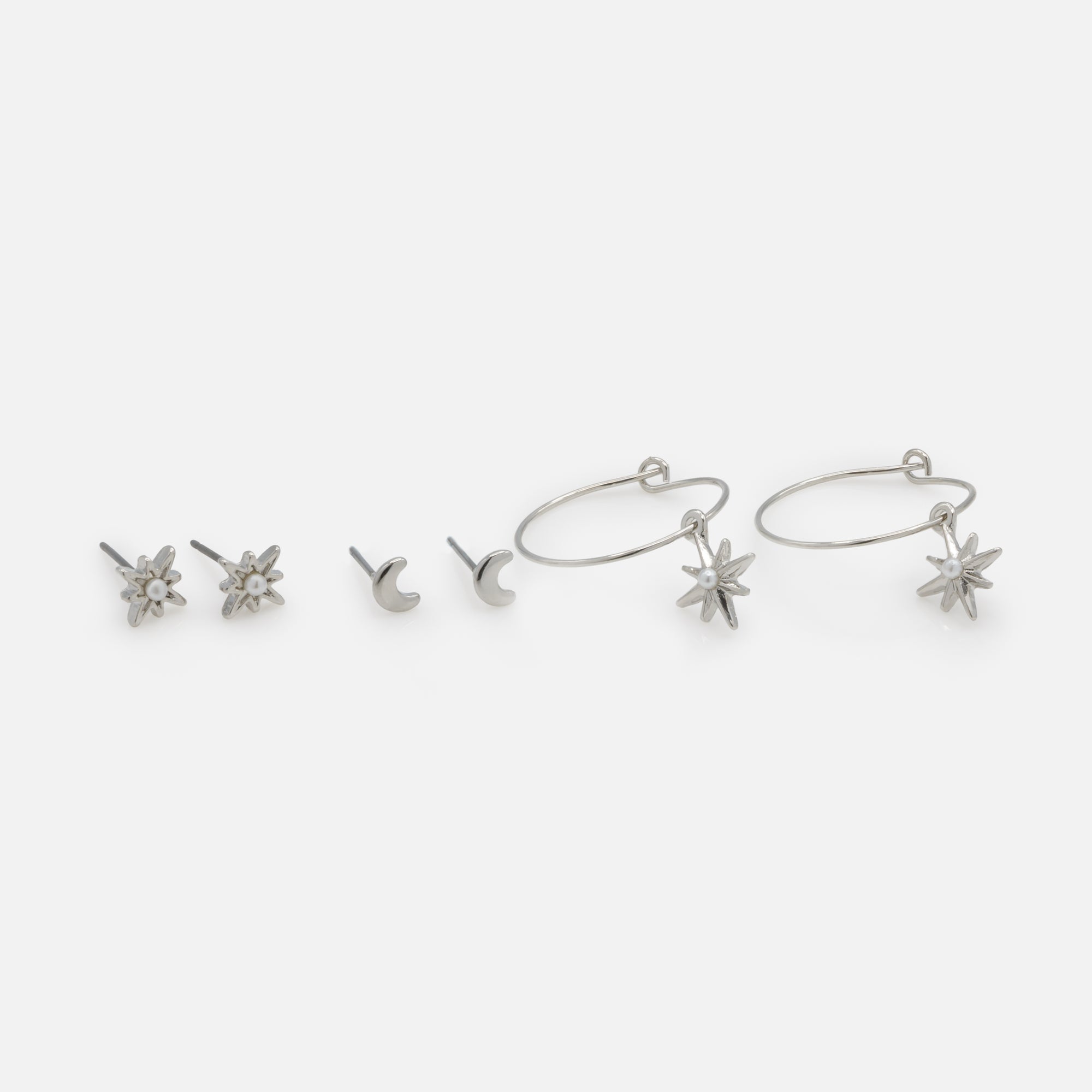 Trio of silver stars and moon earrings with pearls