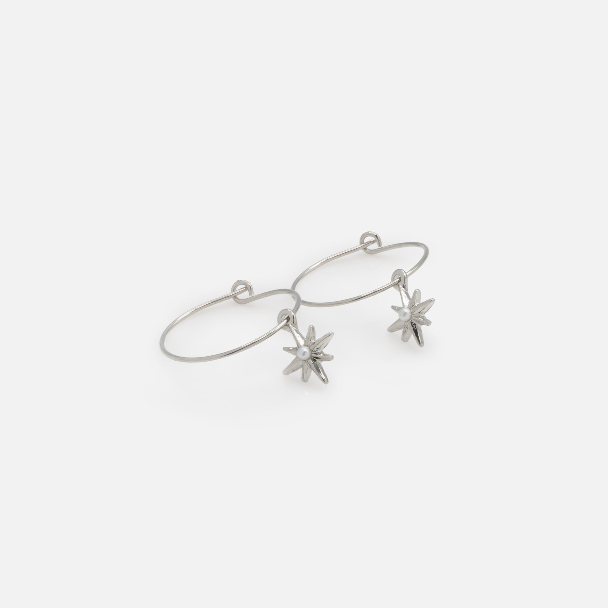 Trio of silver stars and moon earrings with pearls