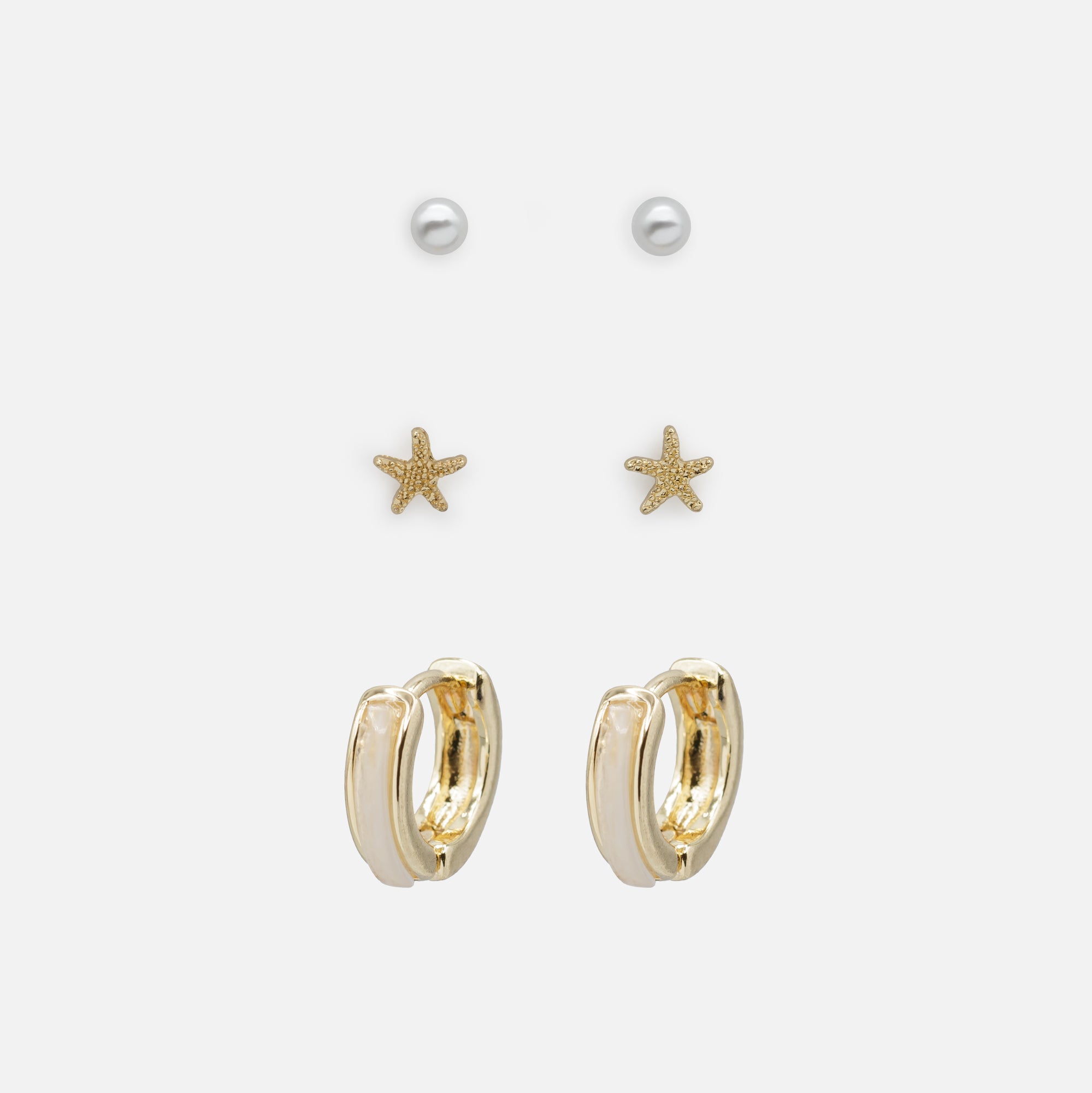 Trio of starfish pearl earrings and gold rings with pearly band