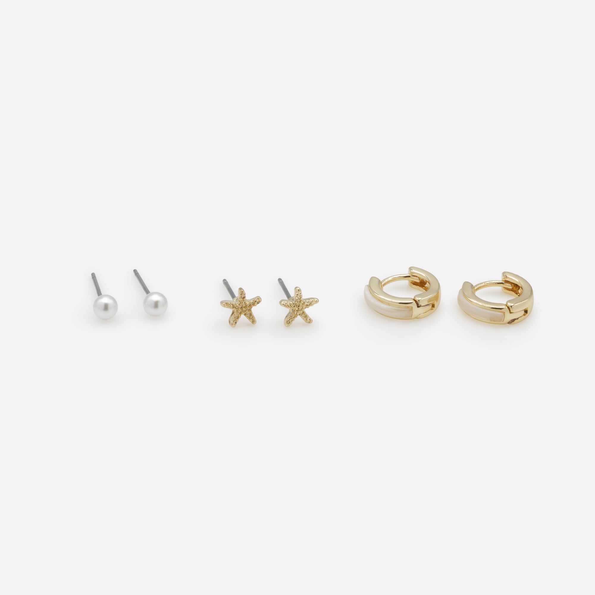 Trio of starfish pearl earrings and gold rings with pearly band