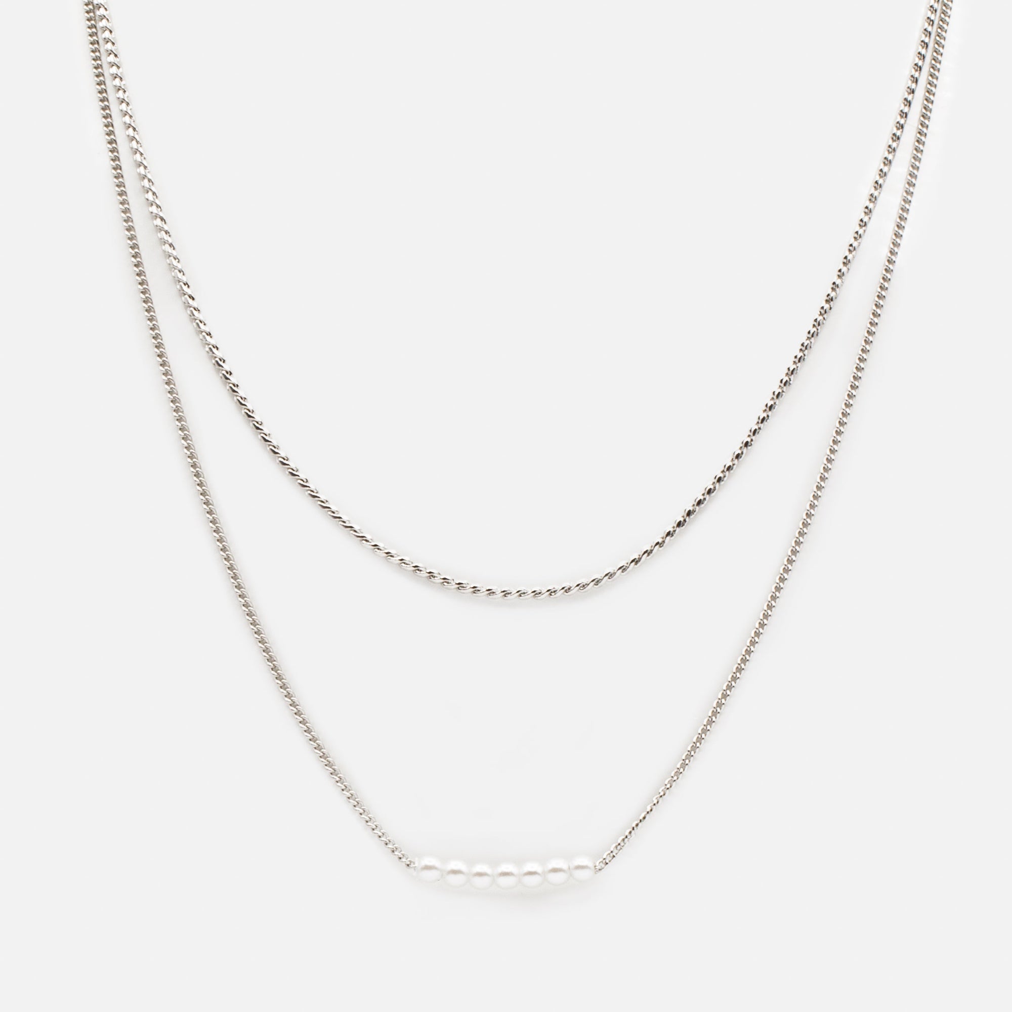 Set of two silver necklaces with "s" links and round synthetic pearls