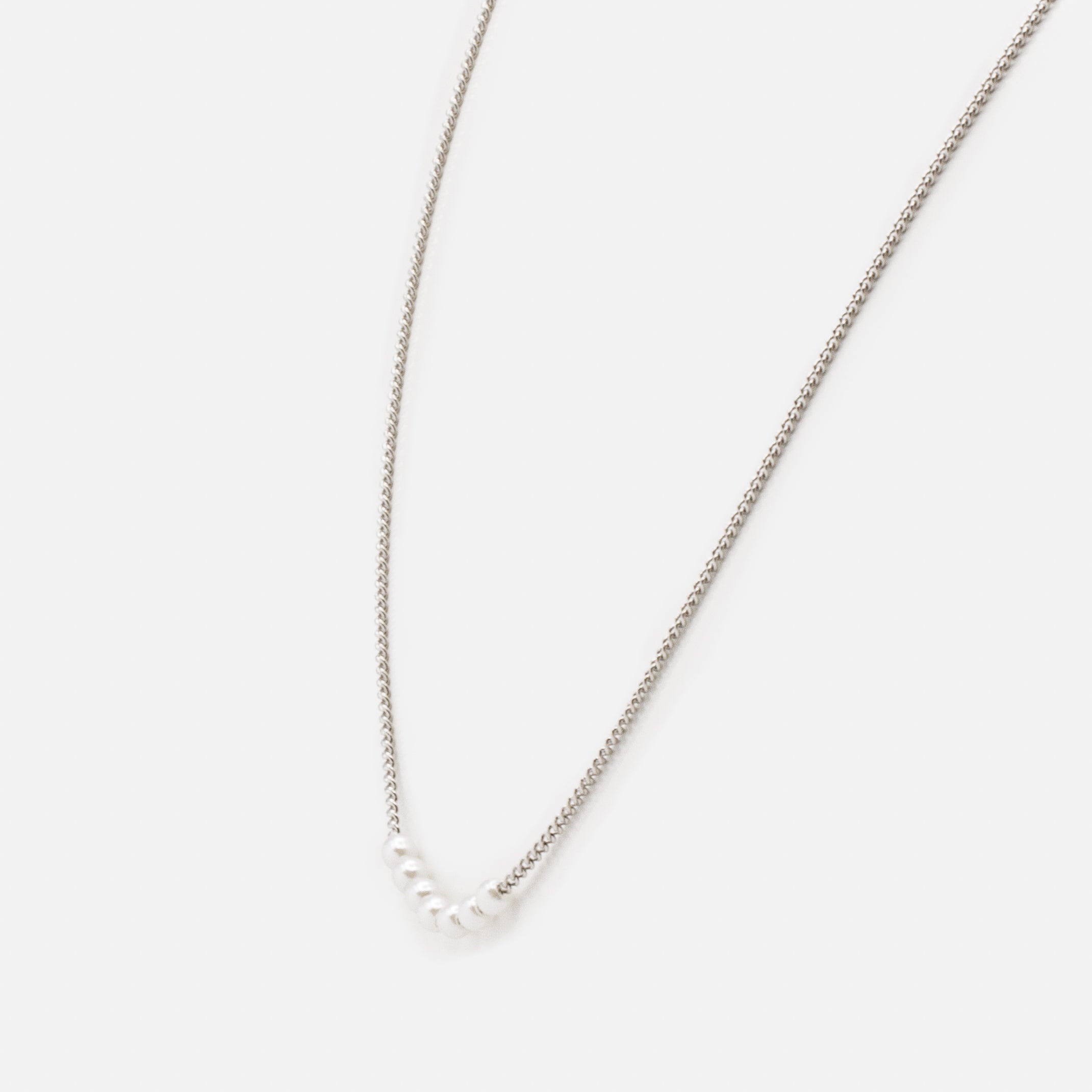 Set of two silver necklaces with "s" links and round synthetic pearls