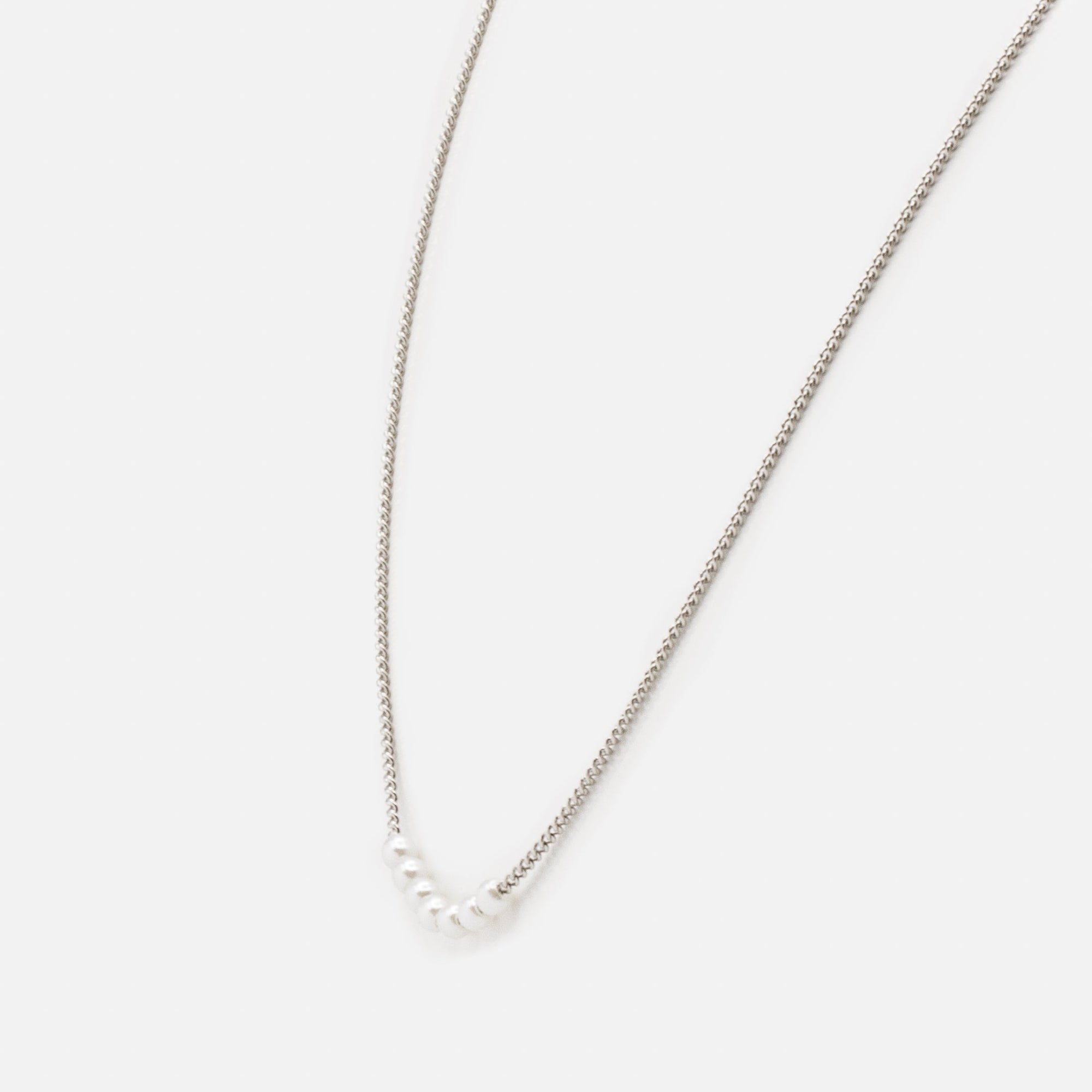 Set of two silver necklaces with "s" links and round synthetic pearls