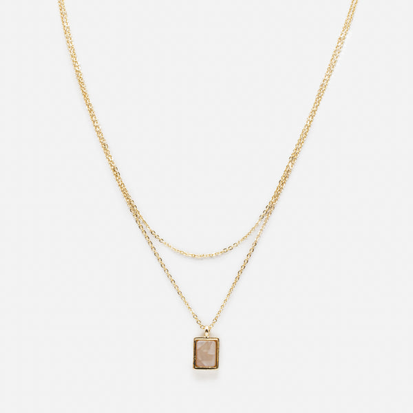 Load image into Gallery viewer, Double golden chain necklace with rectangular pendant and pale pink stone
