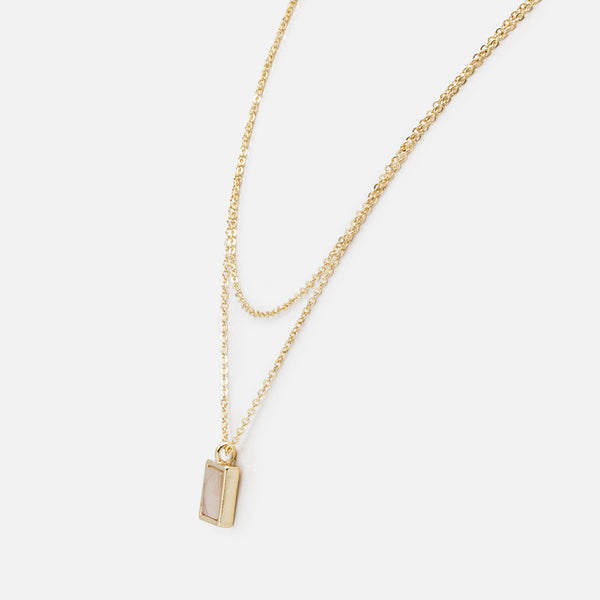 Load image into Gallery viewer, Double golden chain necklace with rectangular pendant and pale pink stone
