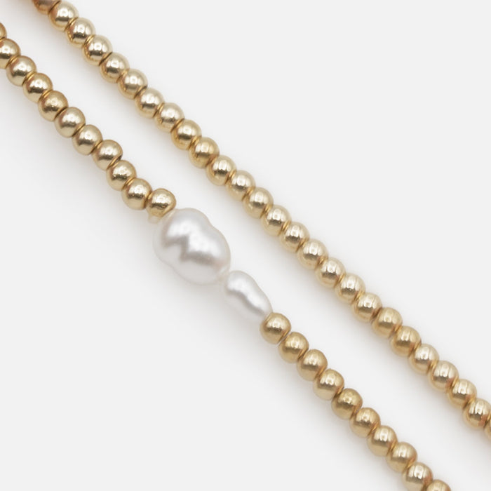 Trio of golden elastic bracelets with synthetic pearls, three ways to wear