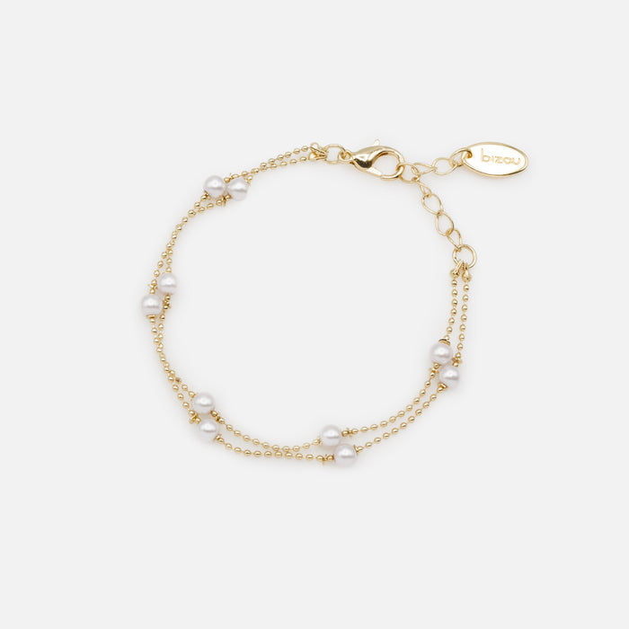 Double chain bracelet with fine gold beads and round pearls