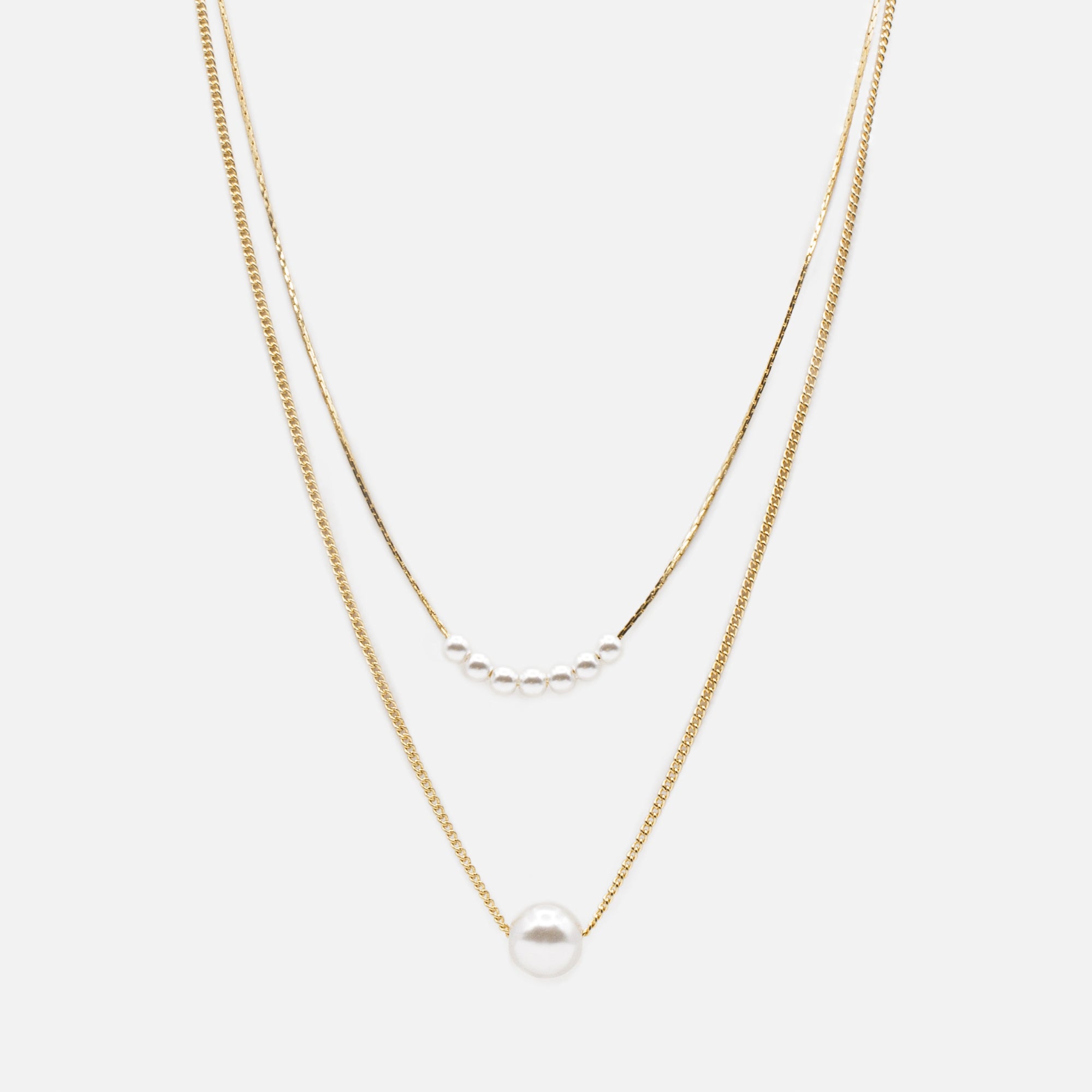 Gold double chain necklace with synthetic round pearls in two sizes