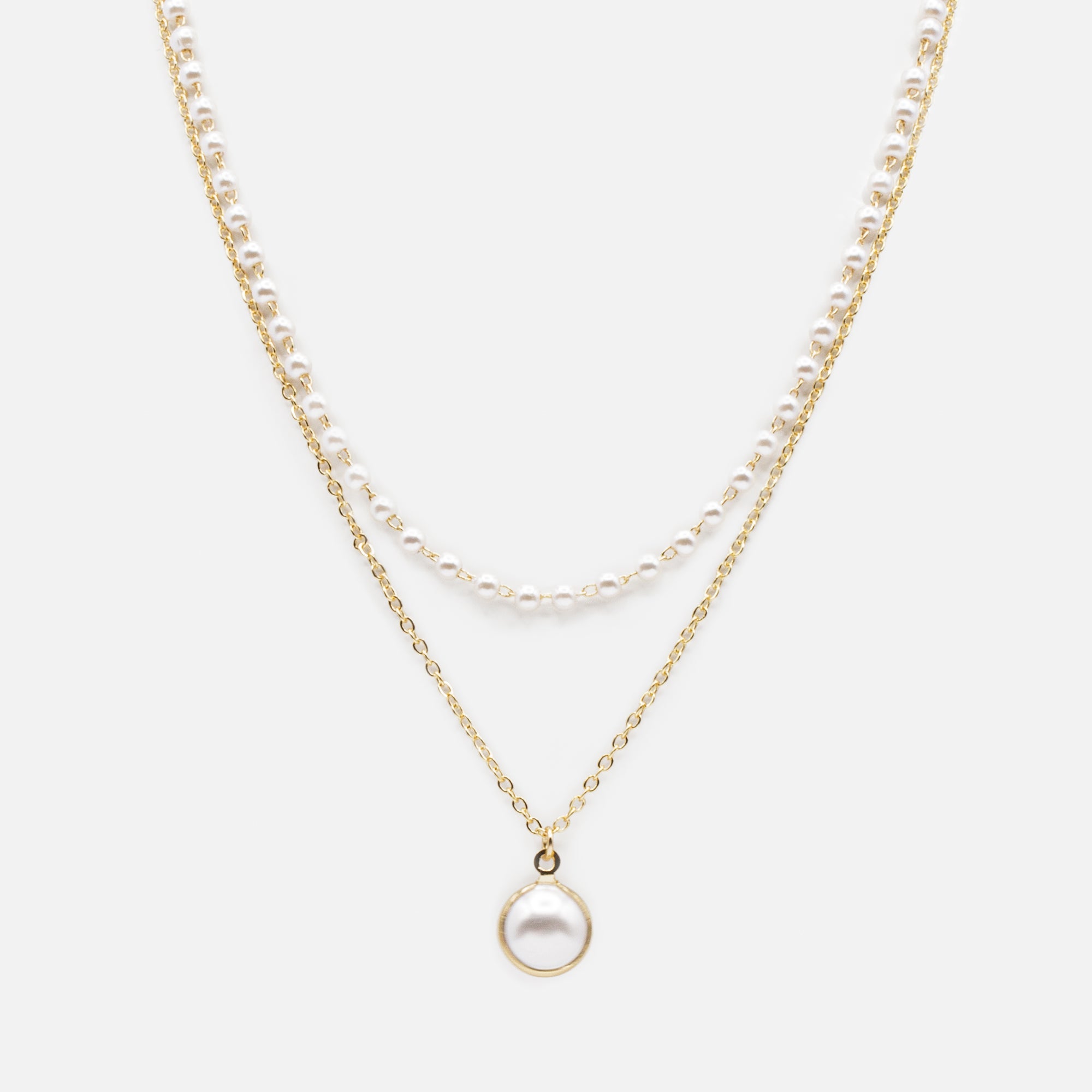 Collier double chaîne pendentif perle dans son anneau doré