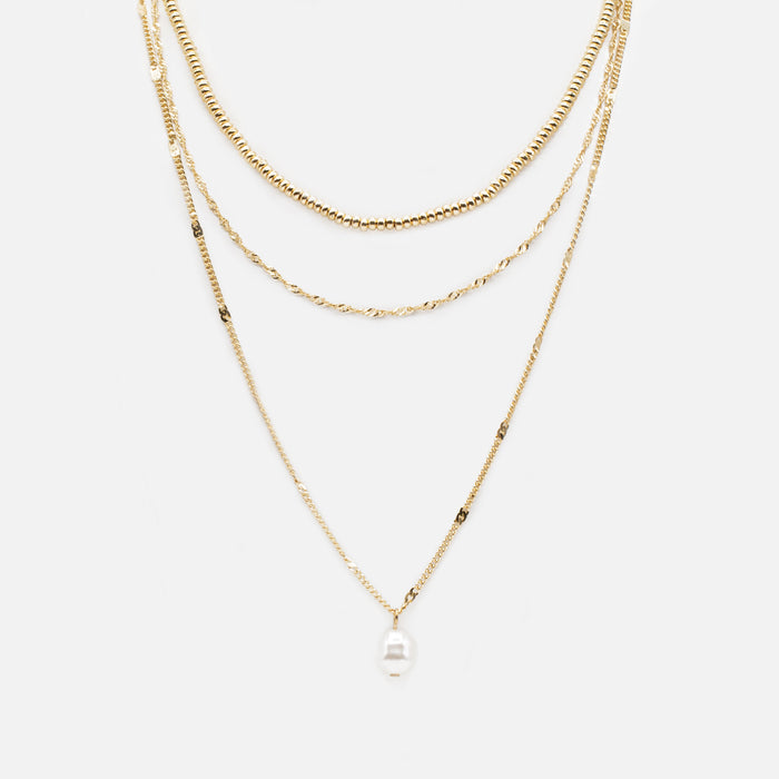 Triple chain necklace with synthetic pearl pendant and gold beads