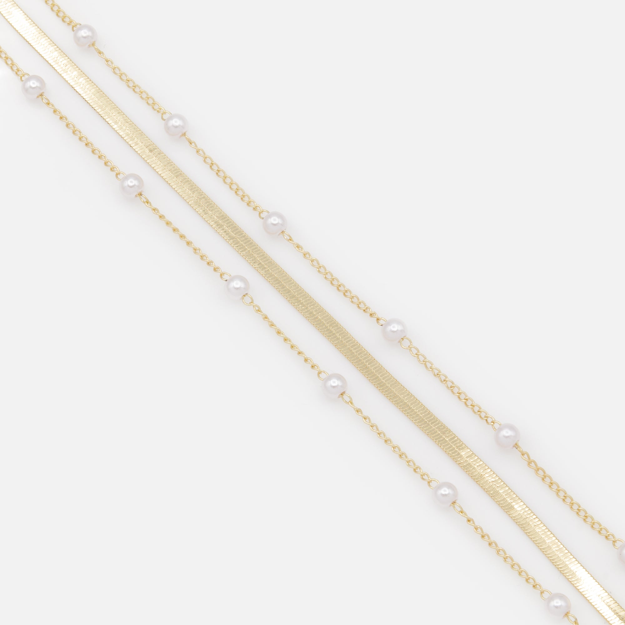 Trio de chaînes de cheville dorées à mailles serpentines plates et perles rondes