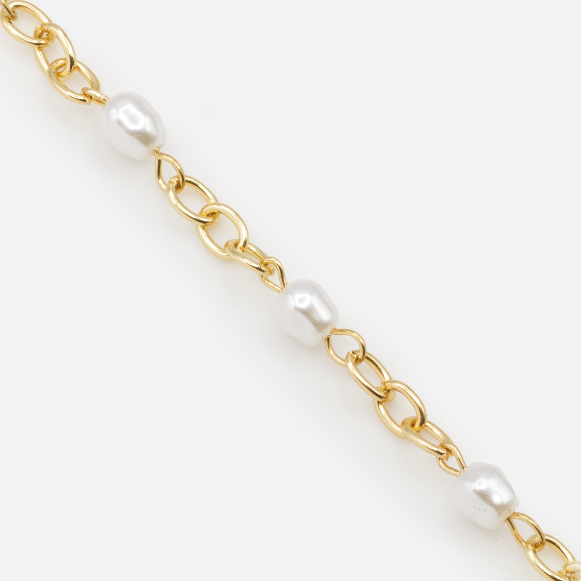 Bracelet mailles dorées et perles