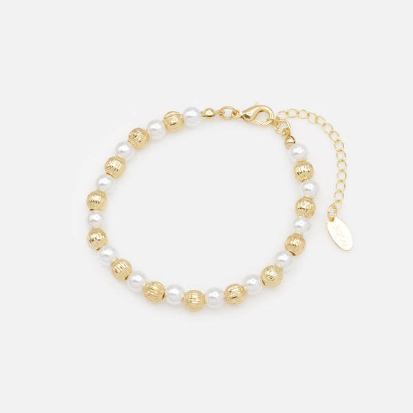Load image into Gallery viewer, Pearl and ball bracelet with golden grooves
