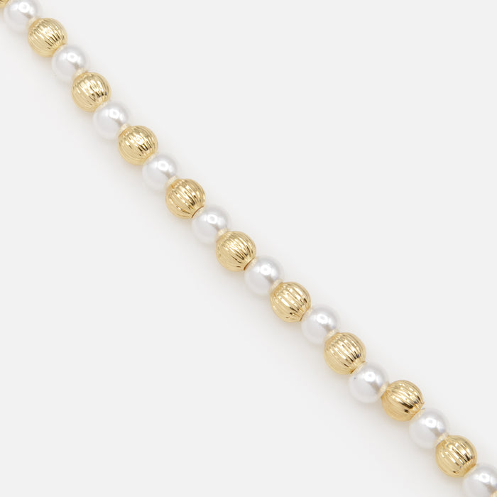 Bracelet perles et billes à rainures dorées