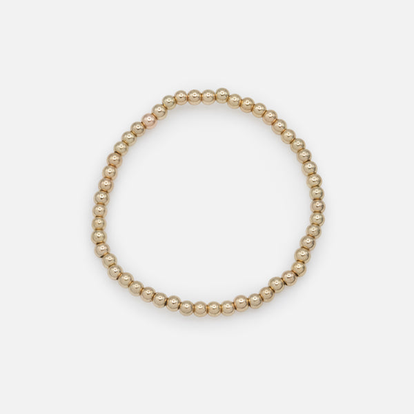 Load image into Gallery viewer, Trio of stretchy pearl and gold bead bracelets
