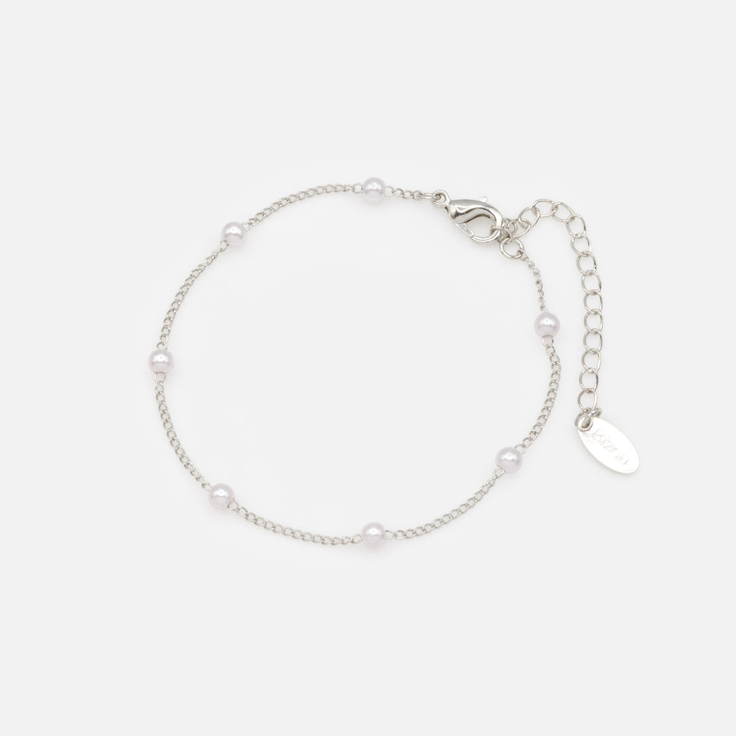 Silver mesh bracelet and delicate pearls