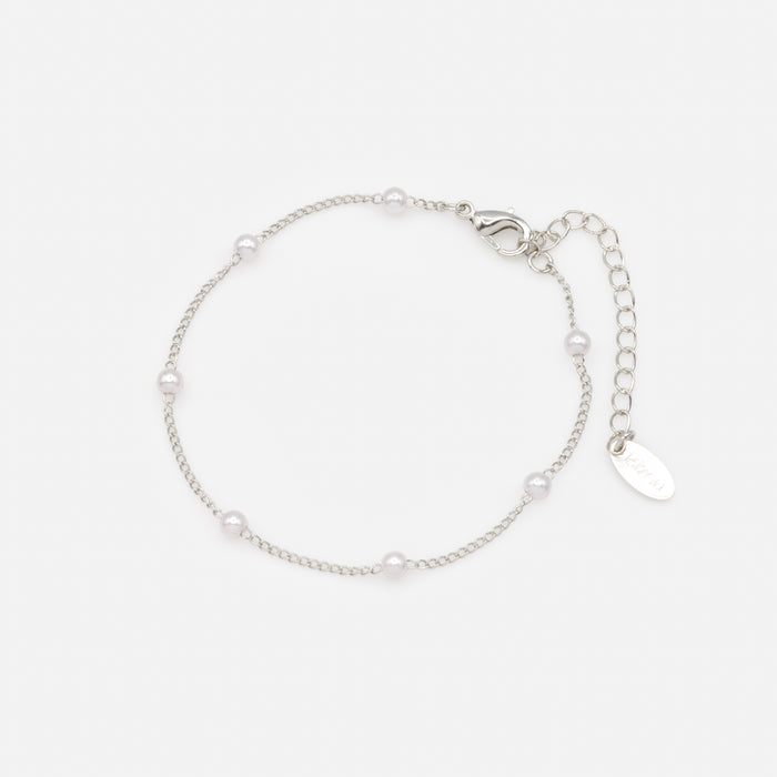 Bracelet argenté mailles et perles délicates
