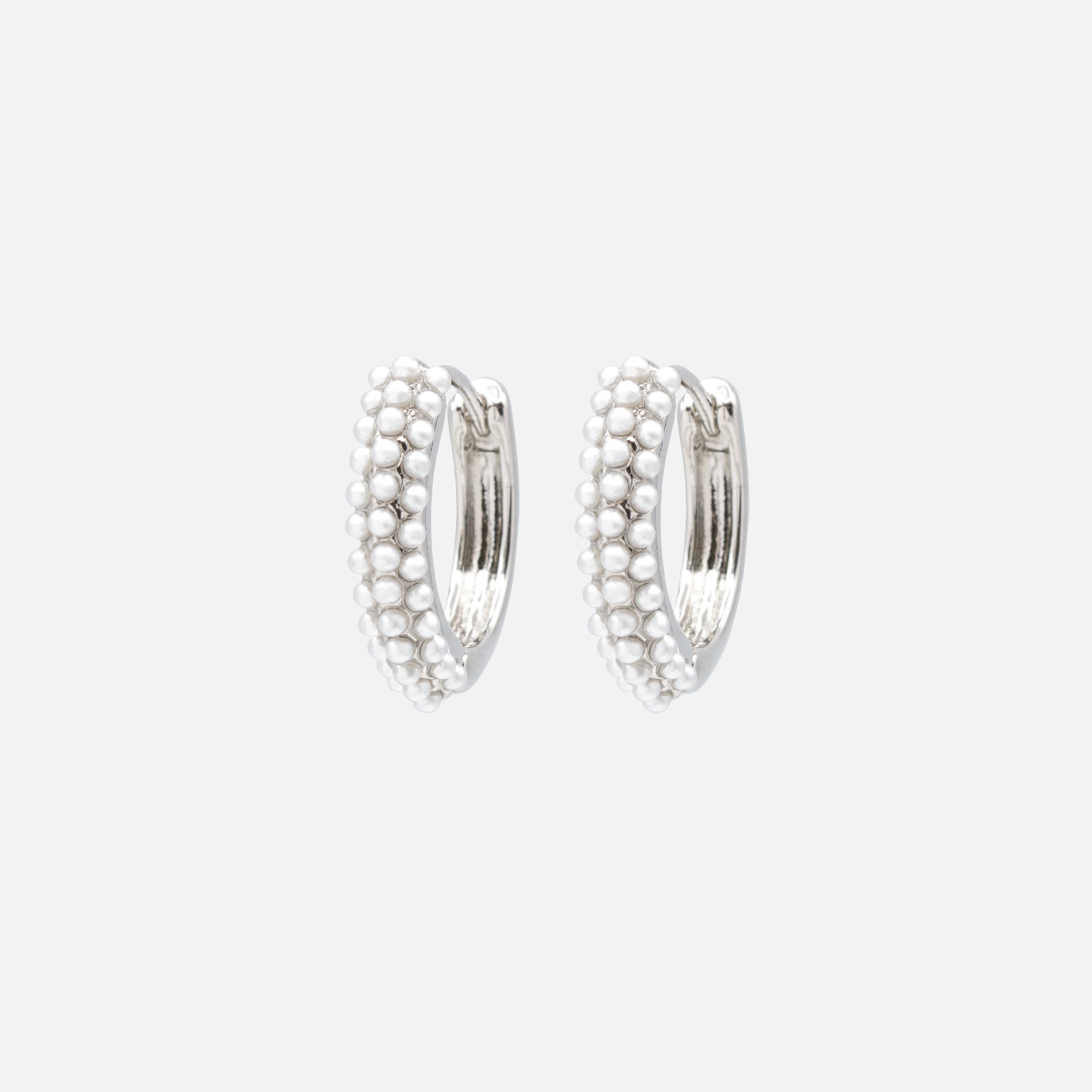 Silver hoop earrings with pearl surface